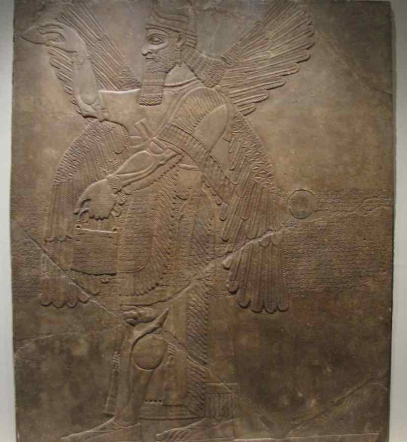photo of Assyrian relief carving of man with wings