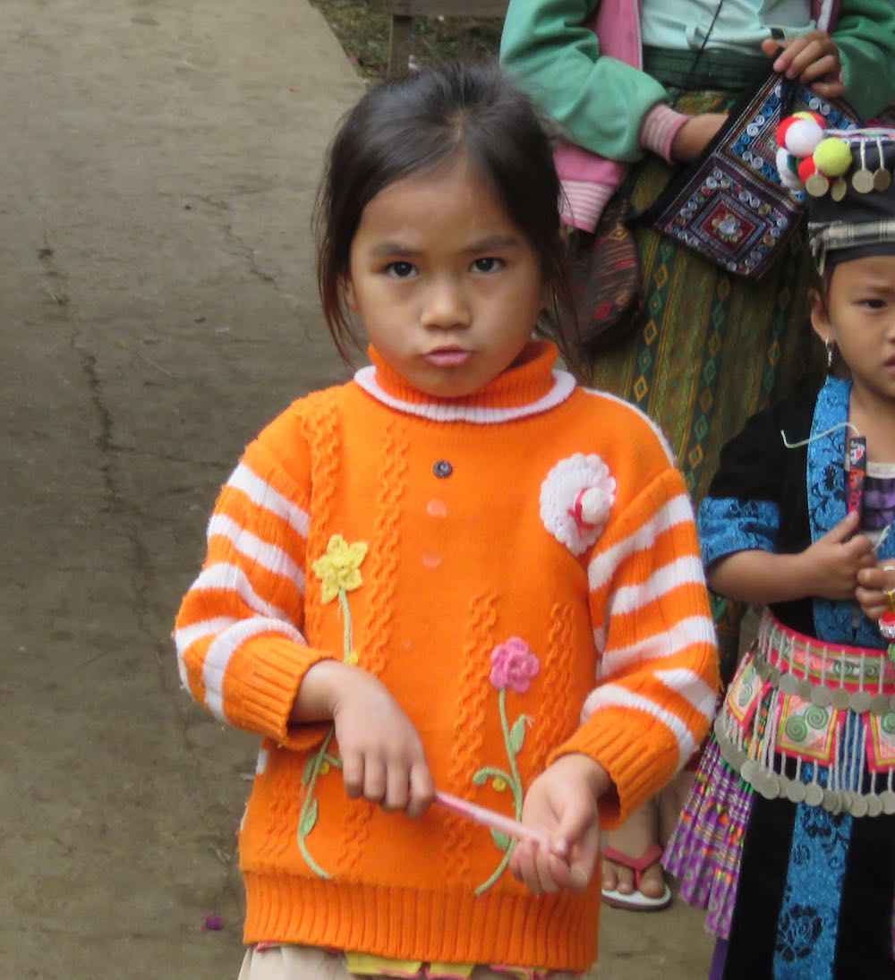 Girl in an orange sweater